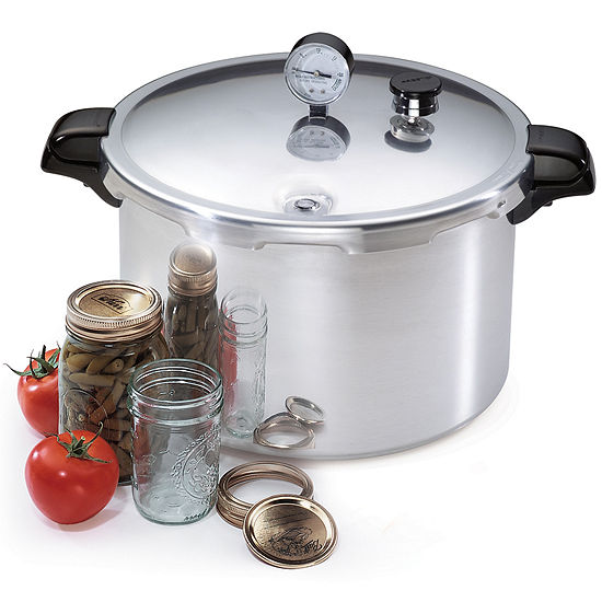 Pressure Canner with jsars and tomatoes on side