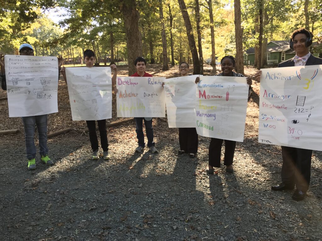 Kids with homemade signs