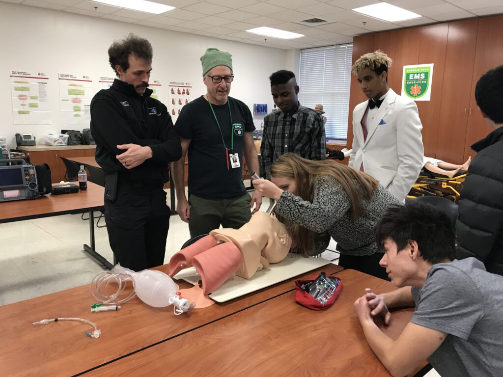 People learning CPR