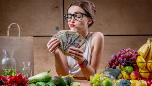 Woman counts money for food